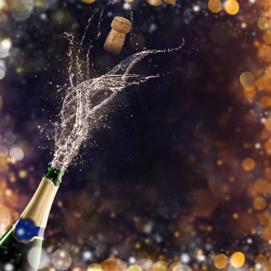 Bottle of champagne with glasses over fireworks background clipart