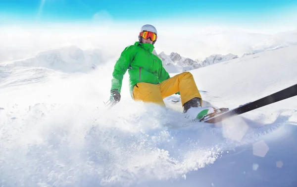 Skier on piste running downhill — Stock Photo, Image