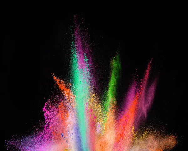 Explosie van gekleurd poeder op zwarte achtergrond — Stockfoto