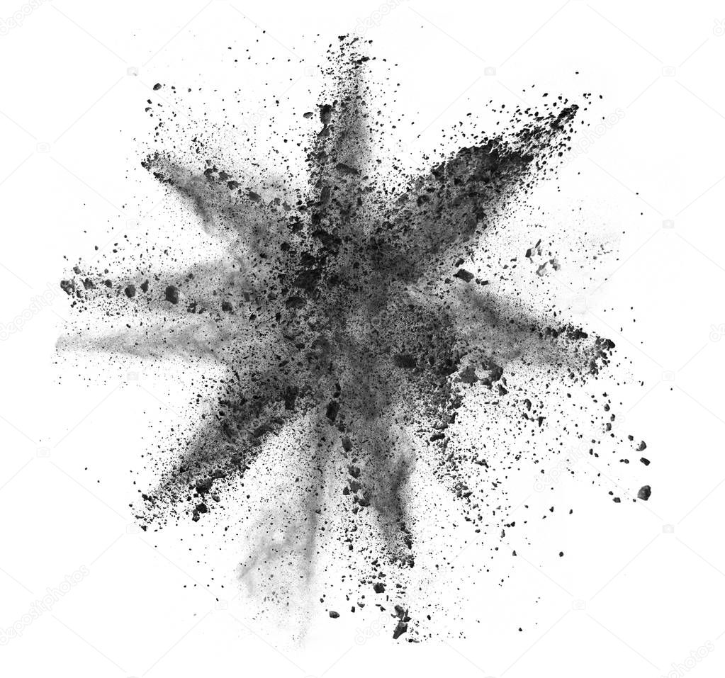 Explosion of black powder on white background