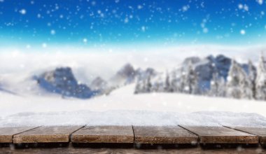 Empty wooden planks with winter alpine mountains clipart