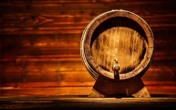 Wooden round barrel with old planks on background — Stock Photo, Image