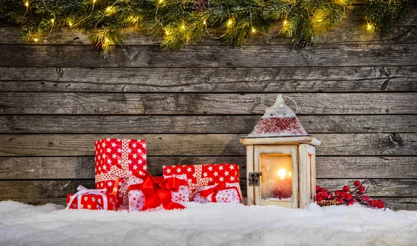 Christmas background with gifts and lantern — Stock Photo, Image