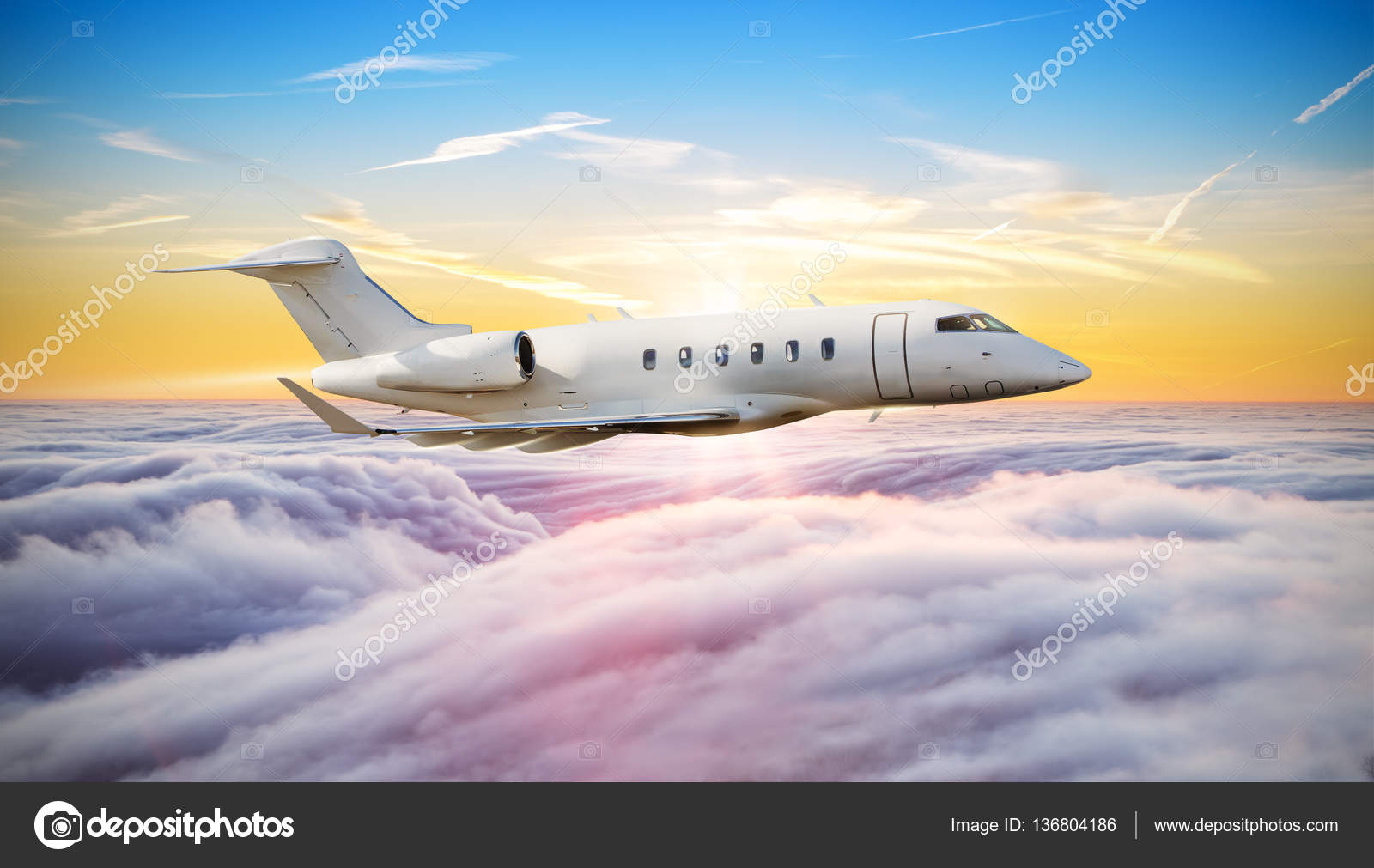 Private jet plane flying above clouds — Stock Photo © jag_cz 136804186
