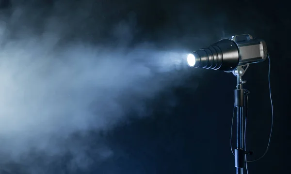 Studio spot light with smoke effect — Stock Photo, Image