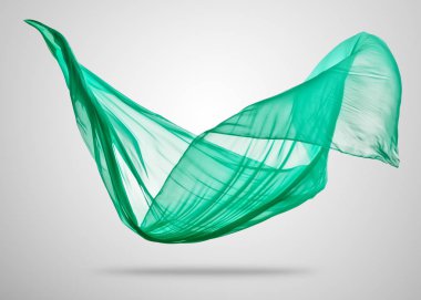 Gri arka plan üzerine yumuşak zarif yeşil kumaş