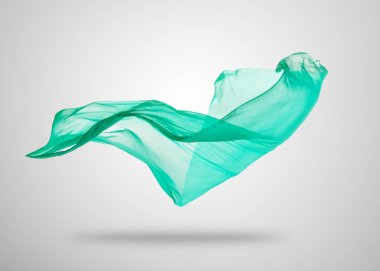 Gri arka plan üzerine yumuşak zarif yeşil kumaş