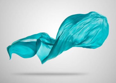 Gri arka plan üzerine yumuşak zarif mavi kumaş