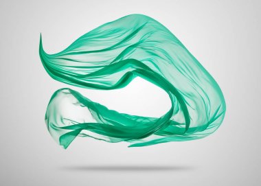 Gri arka plan üzerine yumuşak zarif yeşil kumaş