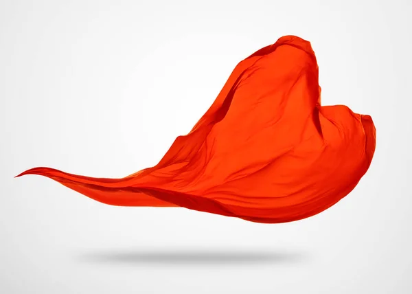 Pano vermelho elegante liso no fundo cinza — Fotografia de Stock