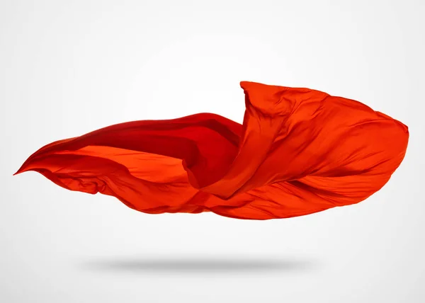 Pano vermelho elegante liso no fundo cinza — Fotografia de Stock