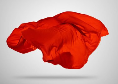 Gri arka plan üzerine yumuşak zarif kırmızı kumaş