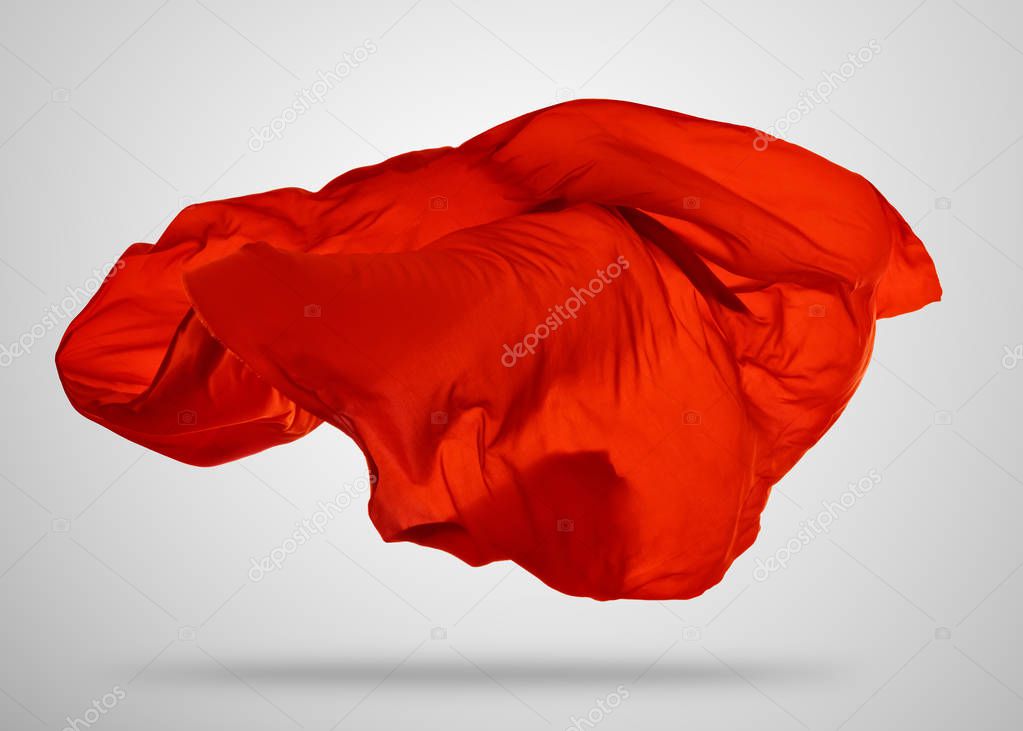 Smooth elegant red cloth on gray background