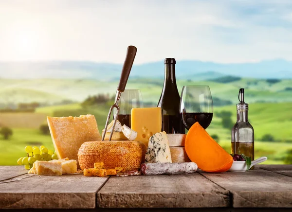 Various kind of cheese served on wood — Stock Photo, Image