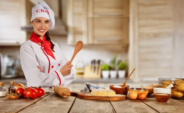 Young chef woman cooker ready for food preparation — Stock Photo, Image