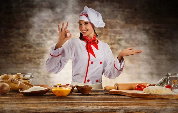 Young chef woman cooker ready for food preparation — Stock Photo, Image