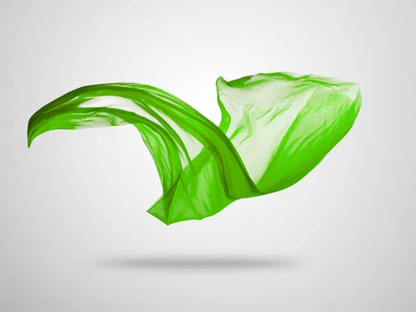 Smidig elegant grön tyg på grå bakgrund — Stockfoto