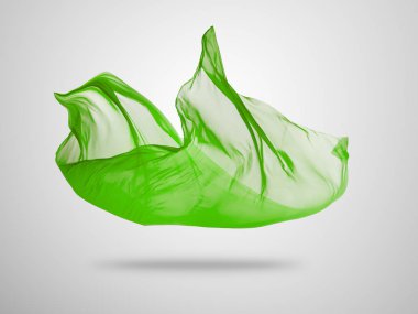 Gri arka plan üzerine yumuşak zarif yeşil kumaş