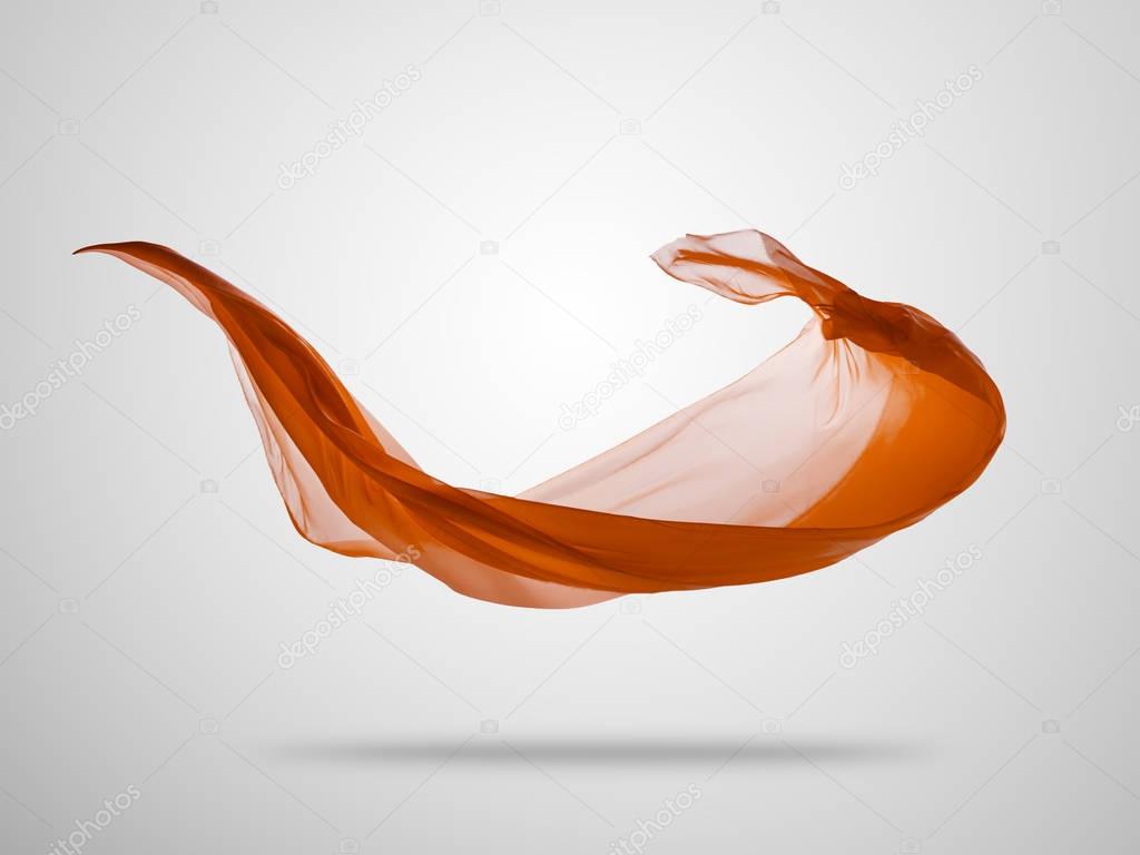 Smooth elegant orange cloth on grey background