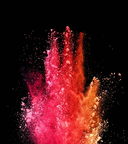 Explosion of colored powder on black background — Stock Photo, Image