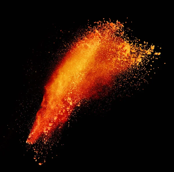 Explosão de pó colorido sobre fundo preto — Fotografia de Stock
