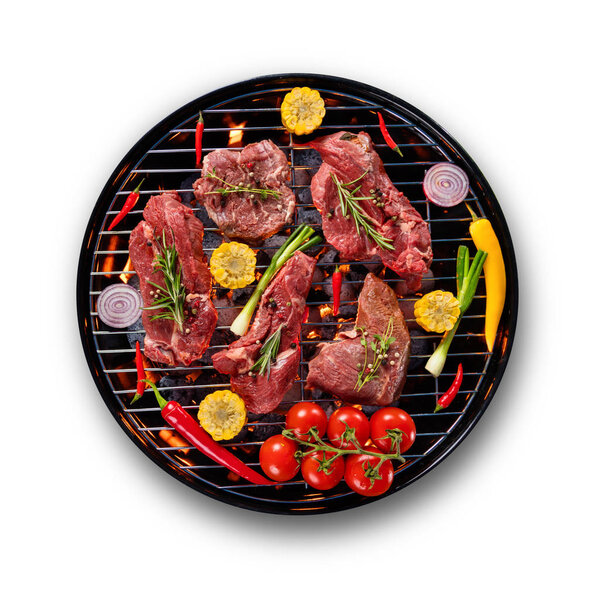 Fresh raw beef steaks placed on grill, isolated on white backgro