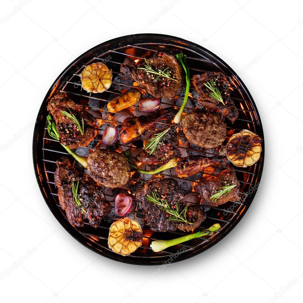 Many kinds of meat placed on grill, isolated on white background