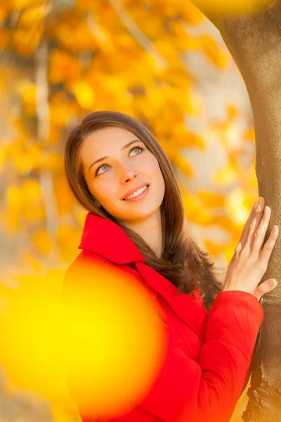 Beautiful young woman autumn portrait with red jacket — Stock Photo, Image