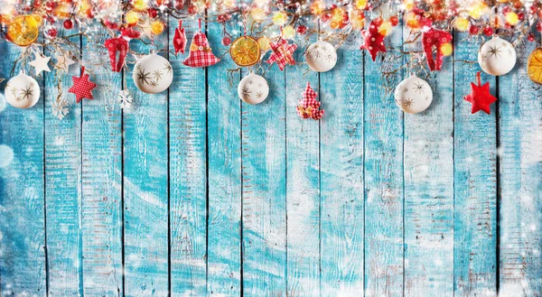 Christmas background with hand made cloth decorations on wooden — Stock Photo, Image