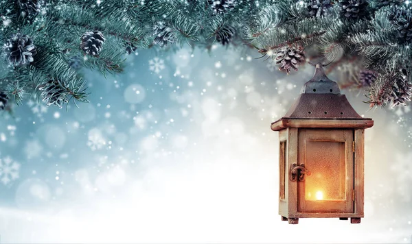 Christmas background with spruce branches and wooden lantern. — Stock Photo, Image