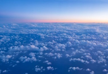 Beautiful sunset panoramic view above clouds clipart