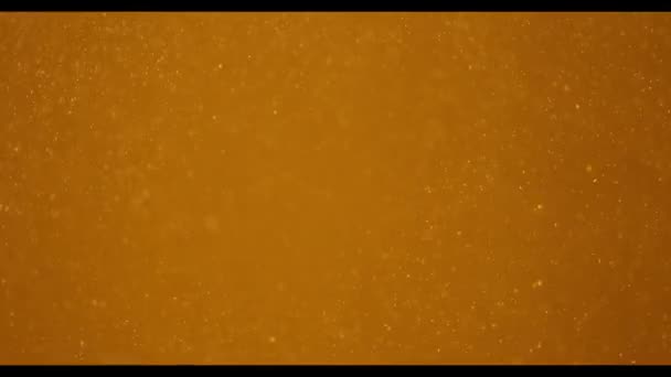 Goldenbackground 上逼真粒子的慢运动 — 图库视频影像