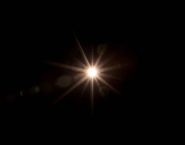 黑色背景下的太阳光线纹理 — 图库照片
