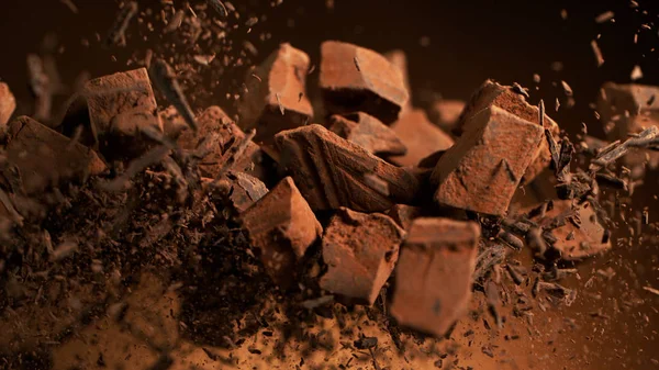 부서진 초콜릿 조각들을 날으는 모습 — 스톡 사진