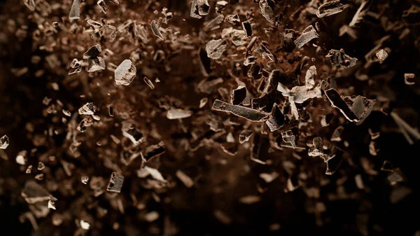 Movimento di congelamento del gruppo volante di pezzi di cioccolato crudo . — Foto Stock