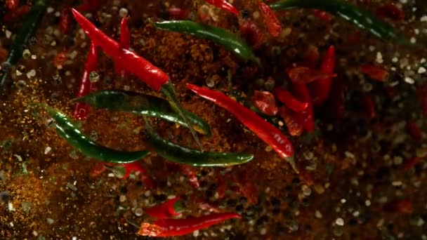 Super slow motion of flying spices mix with chilli peppers. Filmed on high speed cinema camera, 1000 fps