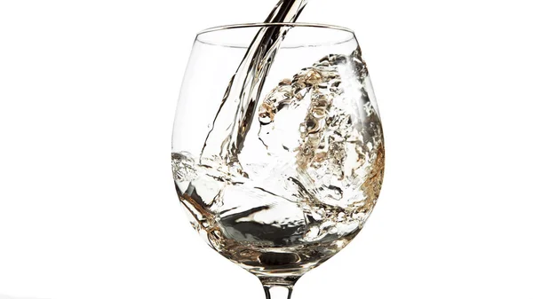 Detail of pouring white wine into glass on white — Stock Photo, Image