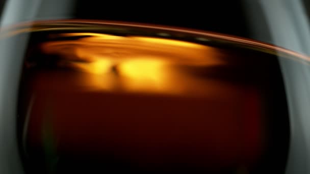 Super Slow Motion Waving Whiskey Cognac Rum Macro Shot Filmed — Stock Video