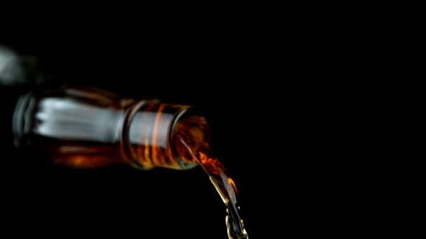 Super Slow Motion Pouring Whiskey Rum Closeup Detail Black Background — Stock Video