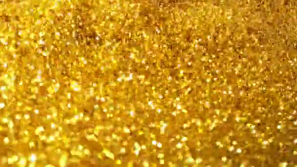 การเคล อนไหวช ดของอน ภาคทองค าแวววาวบนพ นหล ความล กของจ ดโฟก ายท — วีดีโอสต็อก