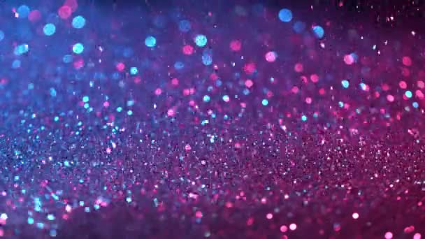 Super Slow Motion Sparkling Abstract Glittering Background Neon Colours Filmed — Stock Video