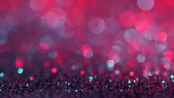 Super Slow Motion Sparkling Abstract Glittering Background Neon Colours Filmed — Stock Video