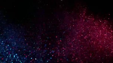 Soyut parlak arka planda neon renklerle parıldayan süper yavaş çekim. Çok hızlı bir kamerayla çekildi, 1000 fps..