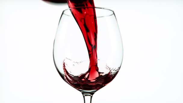 Super Slow Motion Pouring Red Wine Detail Isolated White Background — Stockvideo