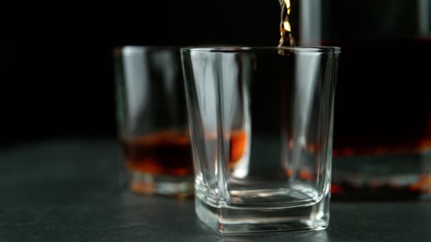 Super Slow Motion Pouring Whiskey Glass Camera Motion Filmed High — Stock Video