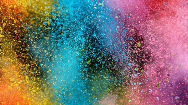 Esplosione di polvere colorata isolata su sfondo nero — Foto Stock
