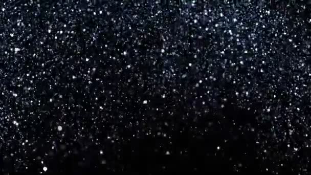 Super Slow Motion Glittering Silver Particles Black Background Shallow Depth — Stock Video