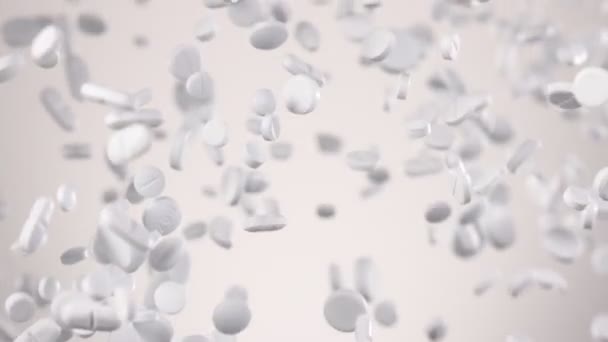 Super Zpomalený Pohyb Padající Bílé Pilulky Bílém Pozadí Natočeno Vysokorychlostní — Stock video
