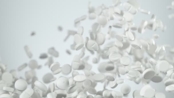 Super Slow Motion Cadere Pillole Bianche Sfondo Bianco Girato Macchina — Video Stock