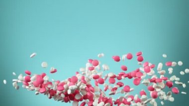 Mavi arka planda beyaz hapların düşüşü çok yavaş oluyor. Yüksek hızlı sinema, yavaş çekim kamera, 1000fps.